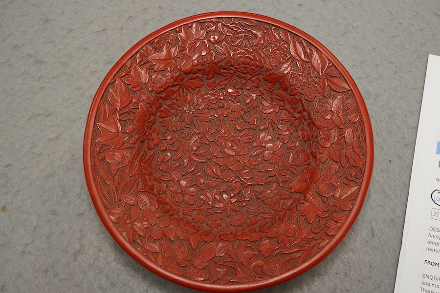 An unusual Chinese cinnabar lacquer ‘thousand flower’ footed dish, 18th/19th century